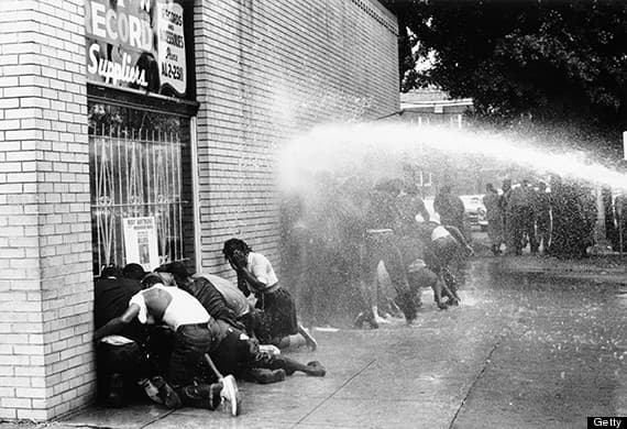 Protesters being hosed